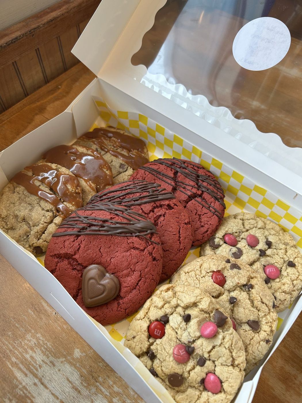 Box of chocolate chip, red velvet, and candy cookies