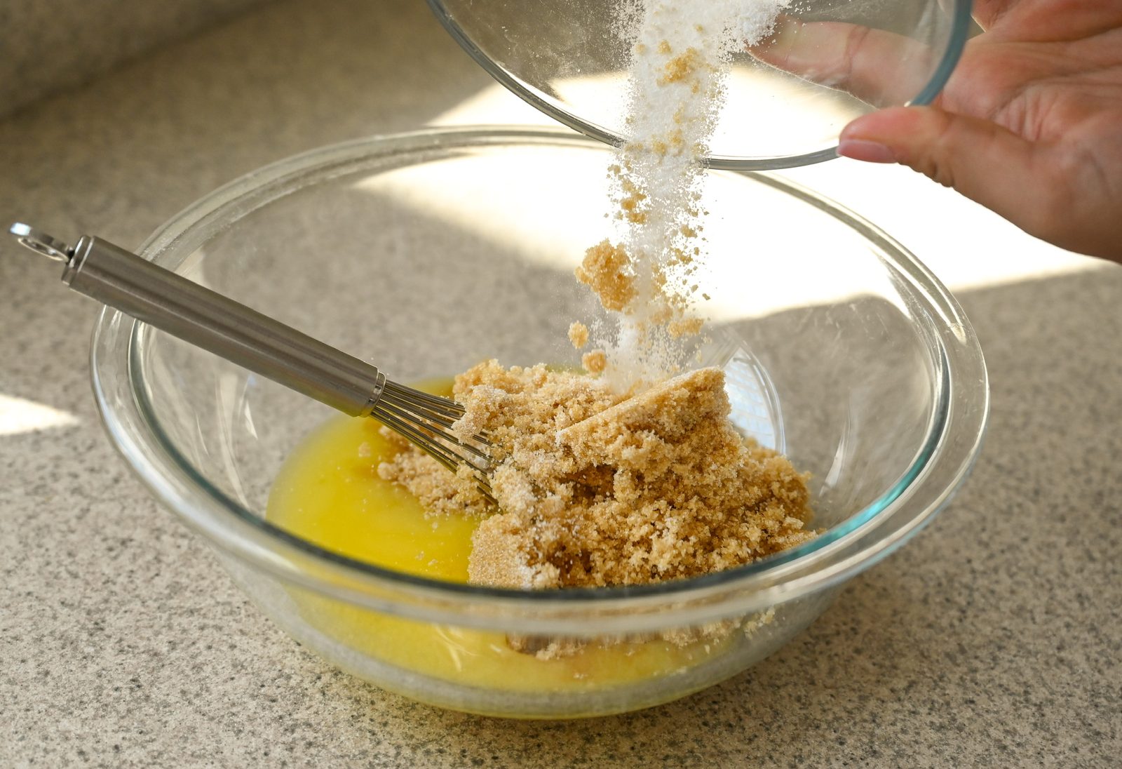 Whisking butter and brown sugar together