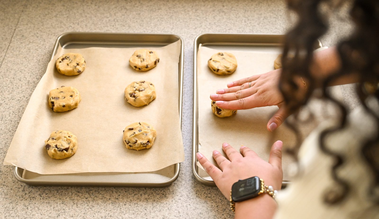 Portioning cookie dough onto baking sheets